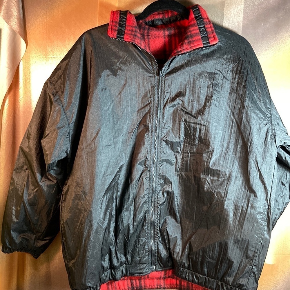 Red and black parachute jacket with reversible red fleece‎ plaid. 50” chest. 211